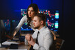 © Serhii - Financial brokers analyzing stock market data on computer screens