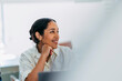 © OchreOchre/Stocksy - Businesswoman Smiling In Office At Work