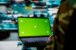 © DC Studio - Green screen mockup laptop used by army officer using reconnaissance tech to do threat monitoring and target recognition. Woman employing warfare intelligence using chroma key notebook software