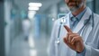 © Suriyo - Doctor entering secure password on hospital system