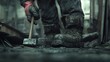 © lini - Worker holding hammer in dusty construction setting