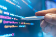 © noppadon - Software developers are examining computer code, which represents the concept of advanced technological information for building network security platforms.