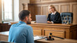 © Mushahid - 'A high-quality, professional photograph of a legal proceeding or mediation session taking place in a wood-paneled courtroom or law office. A man in a blue shirt is seen from the back, sitting across
