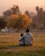 © Mars - Father and Son Sitting Together at Sunset