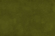© nikol85 - Dark green suede fabric background with matte nap velvet texture. Olive tones and soft felt textile surface in macro