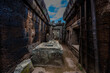 © Emad Aljumah - Ancient stone corridor and altar in Prasat Neang Khmau temple ruins