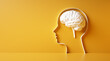 © peterschreiber.media - Conceptual artwork showing a 3D silhouette of a head with white brain against yellow wall
