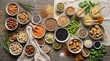 © Nina - Creative flat lay of nuts, seeds, and vegan protein on wooden background with textured fabrics