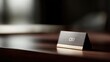 © KASUEMA SALAE - Close up photography of a CEO nameplate on a luxury dark wood desk, blurred background of a high-end office, leadership concept