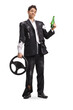 © Ljupco Smokovski - Man in a ruined suit holding a steering wheel and a beer bottle