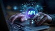 © Anha - Conceptual image of api development and integration with glowing digital interface over a laptop keyboard