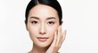 © block - Portrait of a young asian woman with clean skin and calm expression