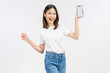 © sitthiphong - Happy young Asian woman holding a smartphone with blank screen and smiling on white studio background