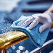 © keks20034 - Crew member polishing chrome railing on yacht bow at sea