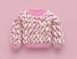© MDNadim - a soft pink and white sweater made of fluffy marshmallow treats. playful fusion concept of food and fashion