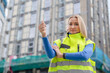 © Iryna - Construction worker prepares to start the day at a building site in the city during daylight hours