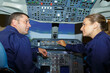© auremar - maintenance team inside the cockpit