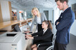 © auremar - reception female worker in a wheelchair