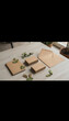 © Kin no Hikari - Eco minimal branding product set with notebook envelope and business card on wooden table with dried leaves for natural style