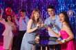 © Pixel-Shot - Young people drinking champagne on prom night