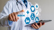 © Bilkes - Doctor touching screen with medicine and healthcare icons medical