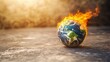 © yuan - Earth engulfed in flames on a concrete surface