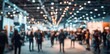 © Giorgi - abstract crowd walking in modern convention center hall