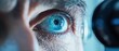 © petrrgoskov - Extreme close up of male patient blue eye during slit lamp examination in ophthalmology clinic, detailed iris and cornea analysis, vision diagnostics concept.