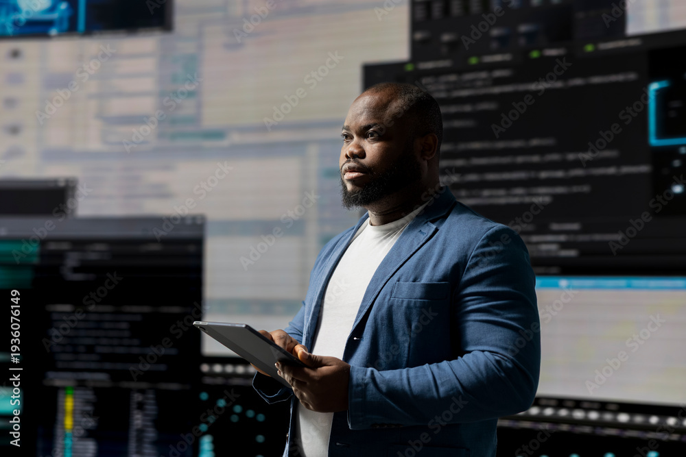 African American developer working on programming and automation ...