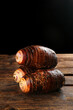 © VuVan - Large Fresh Taro Roots with Sticky Texture on Wooden Background - Guangxi Traditional Betel Nut Produces