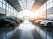 © Jim - Blurred Interior dealership store banner , car park indoor building showroom , car sales , auto leasing, insurance, rental theme. Automotive Industry / Car Dealership