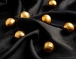 © Colton - black cloth with gold balls on it