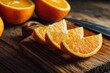 © Sulaihatin - Vibrant orange slices and halves are artfully arranged on a rustic wooden cutting board, highlighting their juicy texture and bright, refreshing color. This close-up shot evokes feelings of health, fr