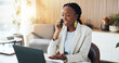 © peopleimages.com - Business, black woman and laptop with phone call in office for real estate, contact client and inquiry. Female realtor, mobile or pc for property listing, schedule viewing and feedback on negotiation