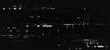 © klyaksun - Glitch effect black background with digital pixel noise and distorted VHS static pattern on screen, abstract vector background. White retro tech aesthetic, pixelated texture overlay.