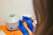 © Gonzalo Infiesta - Veterinarian's gloved hands preparing medical sample for analysis