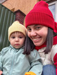 © phpetrunina14 - Smiling mother and toddler in winter beanies outdoor selfie Portrait