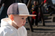 © phpetrunina14 - Child in baseball cap and white hoodie at playground portrait