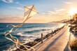 © Andrii  - Colorful kite flying above seaside promenade at golden sunset with ocean waves and coastal landscape