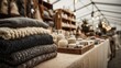 © Rodica - Cozy woolen clothes and accessories display at rustic outdoor market stall