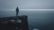 © Mix Creative - Mature man standing on cliff overlooking vast dark ocean at dusk, contemplative posture, wind in clothing