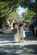 © apichat - Women friends traveling walking pointing in summer market