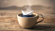 © Ardanapic - Minimal surreal concept of a tiny paper boat sailing in a cup of coffee like an ocean