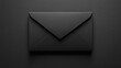© MUHAMMAD - Elegant luxury black envelope sealed shut against a dark matte background emphasizing minimalist design and important correspondence concepts.