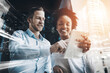 © peopleimages.com - Tablet, research and business people in office with double exposure, check project and digital marketing. Flare, team and talk in workplace with tech, city overlay and online advertising campaign.