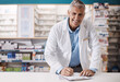 © peopleimages.com - Portrait, man and pharmacist with clipboard at pharmacy with expert,, about us and prescription. Smile, mature person or notes for medicine checklist, dosage instructions and inventory management