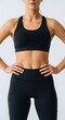 © Designer - Athletic woman in black sports bra and leggings, fit female torso in gym wear, activewear mockup