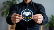 © nakamuto - Man holding hexagon icon with handshake and star symbolizing trust and quality service