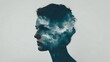© Tanakrit - A double exposure image blending a person's silhouette with a stormy sky featuring lightning and clouds, symbolizing inner turmoil or powerful thoughts.