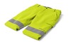 © arif - Folded, bright yellow safety pants with reflective stripes on white